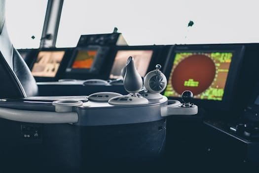 Cum să Alegi Cursul Certificat GMDSS București pentru Ofițeri Avansați 3 Close-up view of ship navigation controls and radar screens, capturing maritime technology.