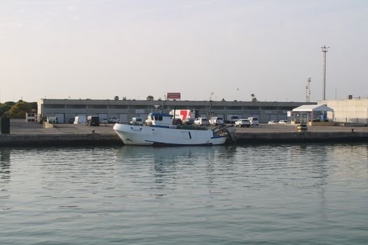 A fishing vessel docked at the port in El Puerto de Santa María, Andalucía, Spain.